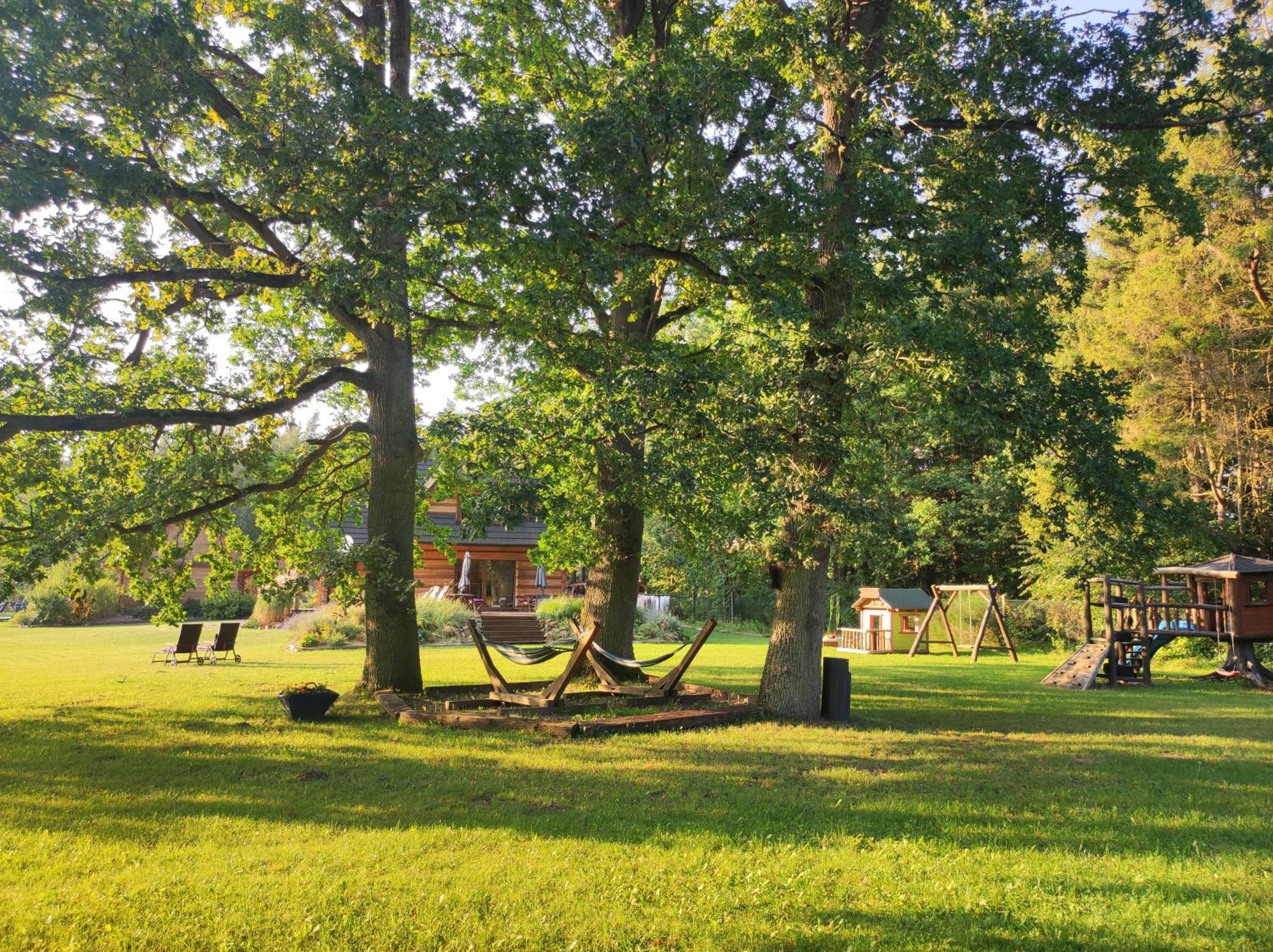 Woodorf-Drewnem: Riverside Log Cabins with Outdoor Activities Ustka Exterior photo